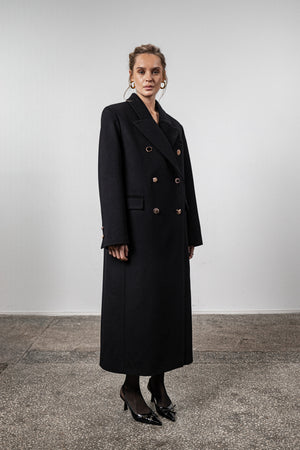 Black coat with various gold buttons