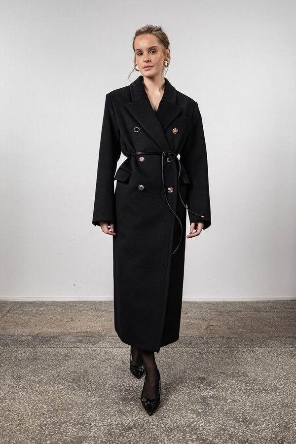 Black coat with various gold buttons