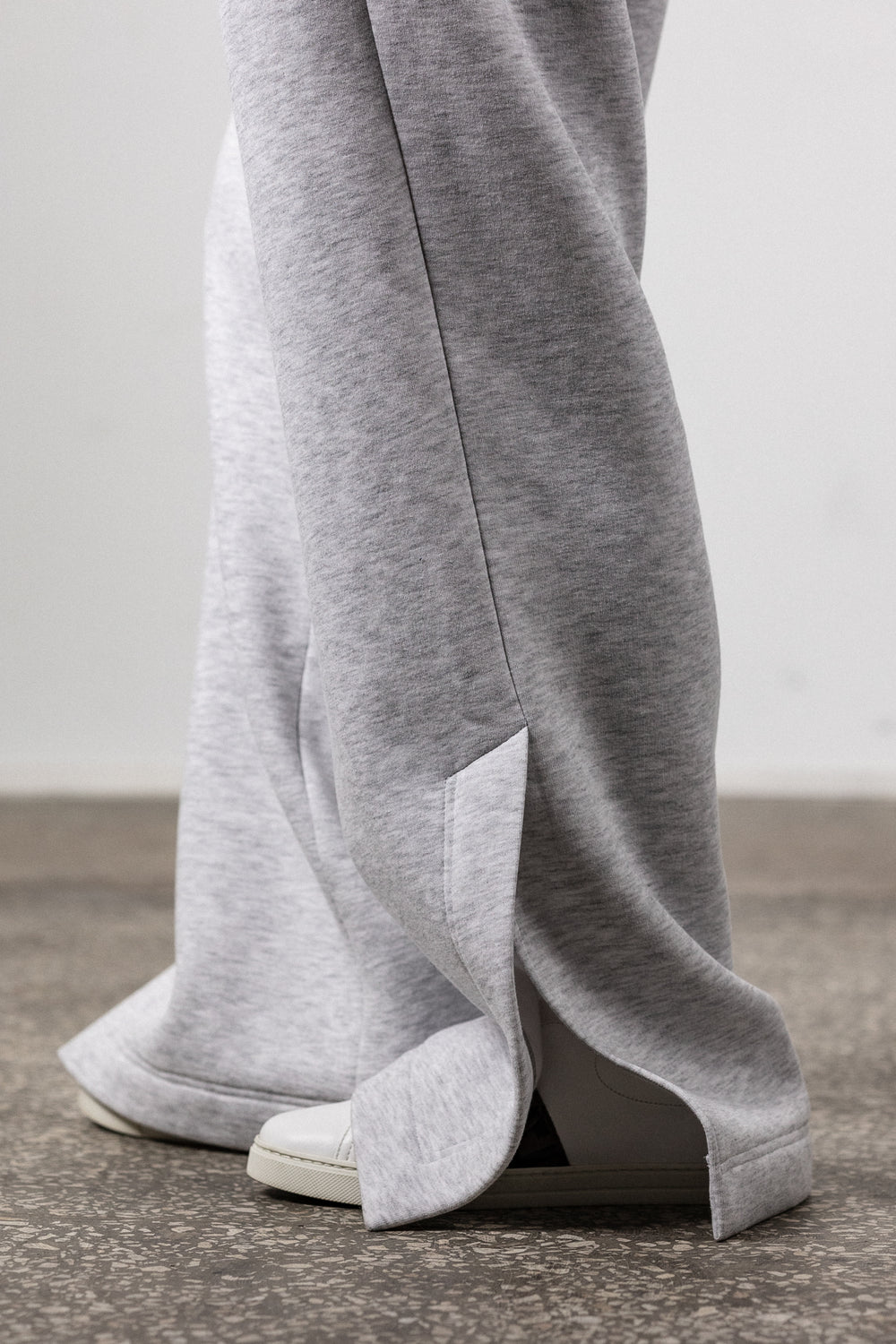 Grey sweatpants with slits