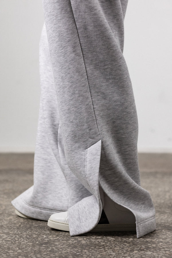 Grey sweatpants with slits