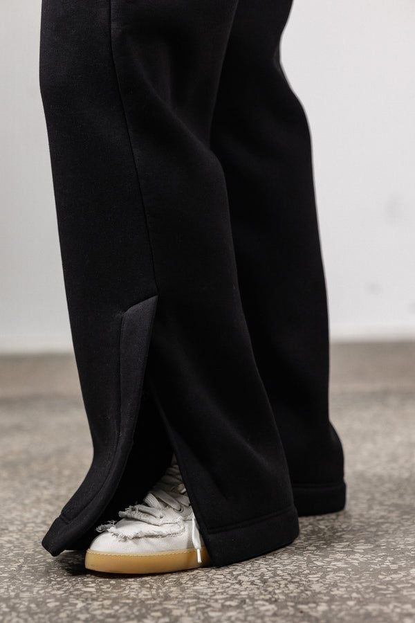 Black sweatpants with slits