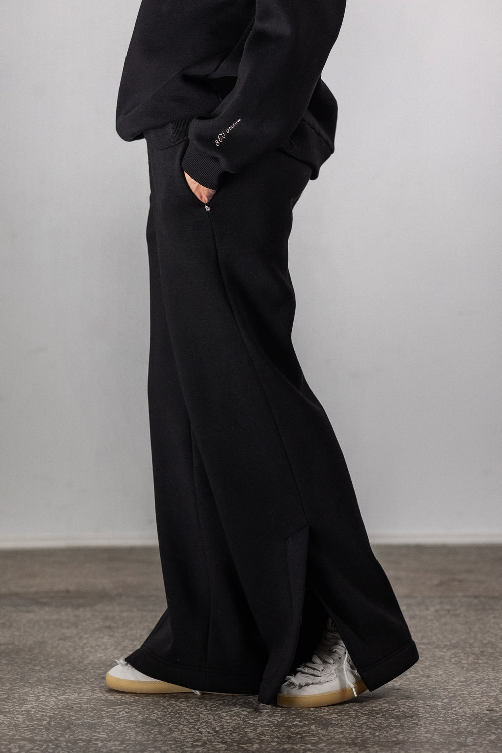 Black sweatpants with slits