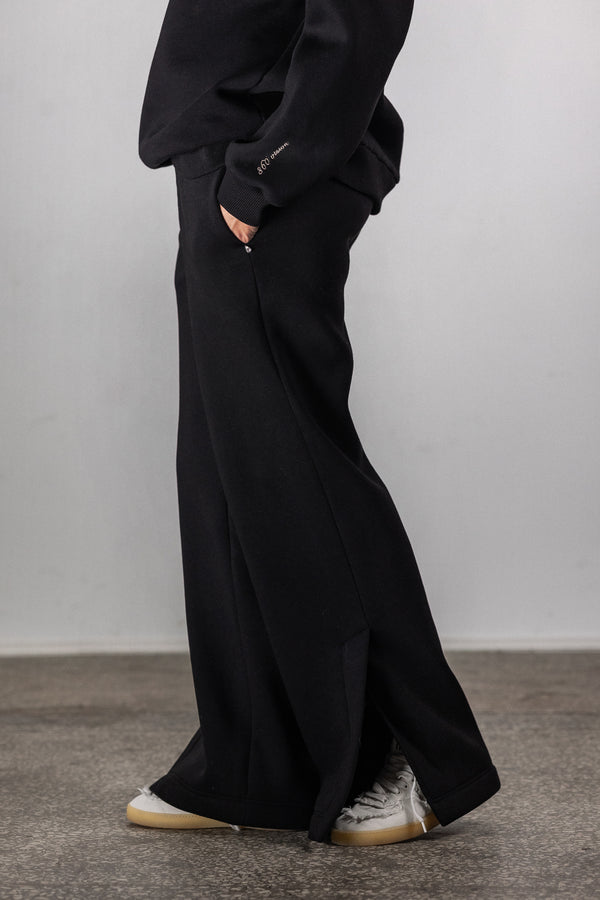 Black sweatpants with slits
